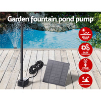 A Gardeon solar pond pump with a submersible water fountain kit, including a solar panel and various nozzles, set against an outdoor background.