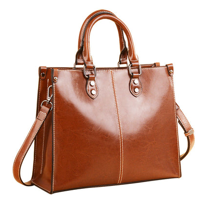 Brown Elegant Leather Handbag - Stylish Brown Tote with Adjustable Strap, Spacious and Durable