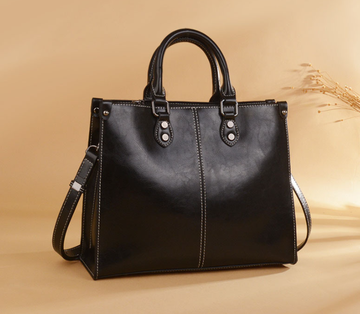 Black Elegant Leather Handbag - Stylish Brown Tote with Adjustable Strap, Spacious and Durable